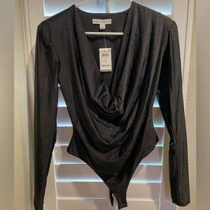 And now this - Black bodysuit